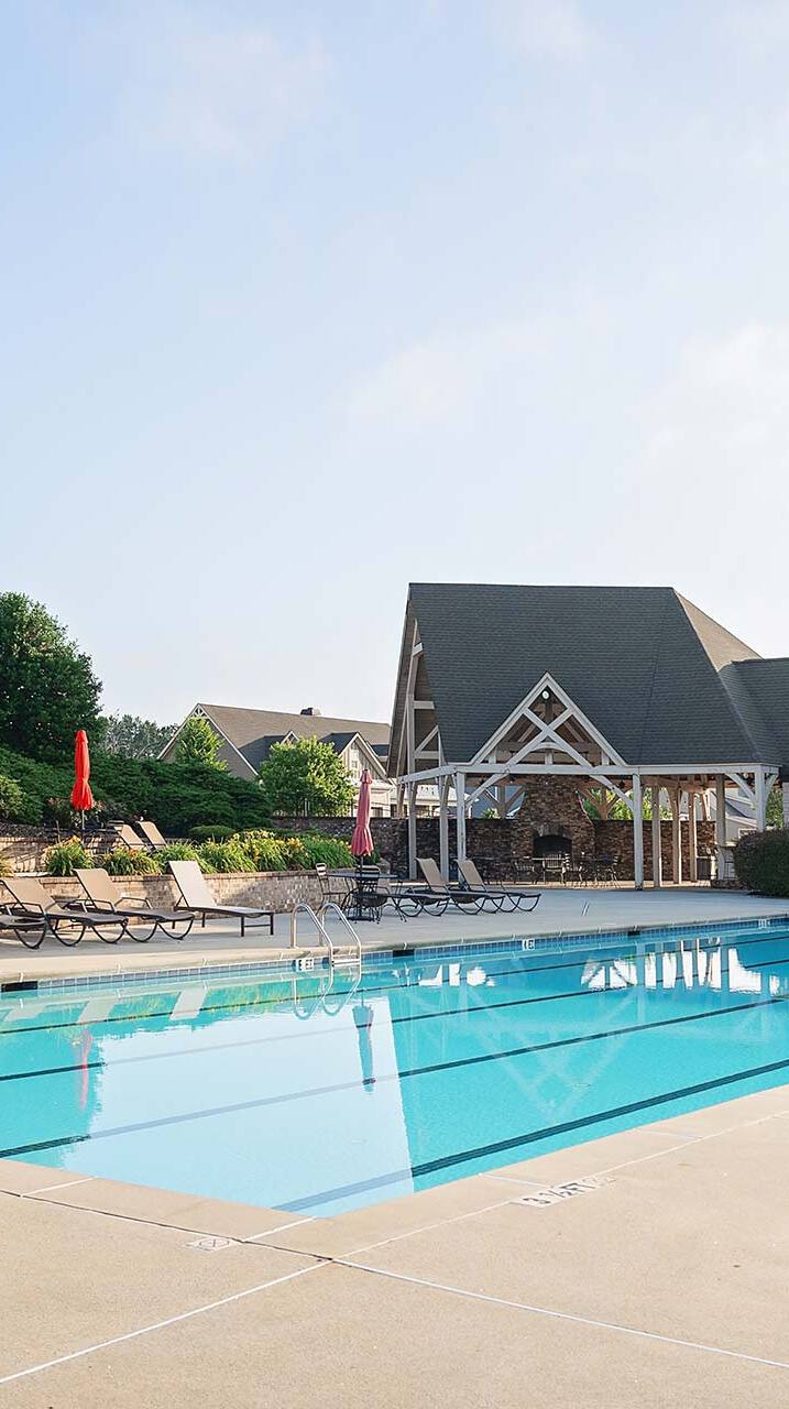 Outdoor pool and lounge chairs