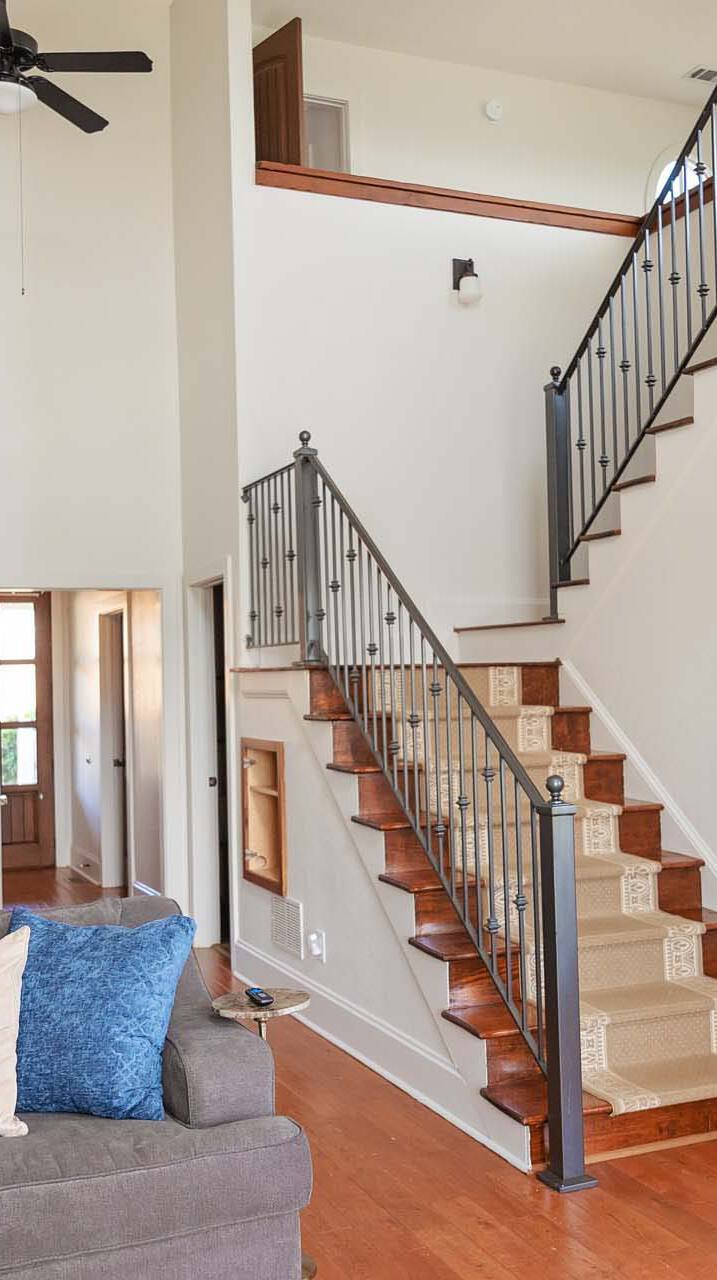 Lodge living space with a sofa and stairs