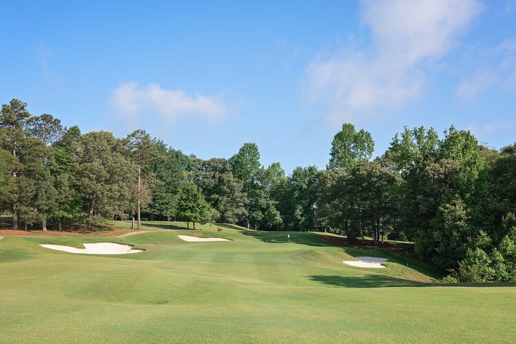 Three sand pits on a golf course